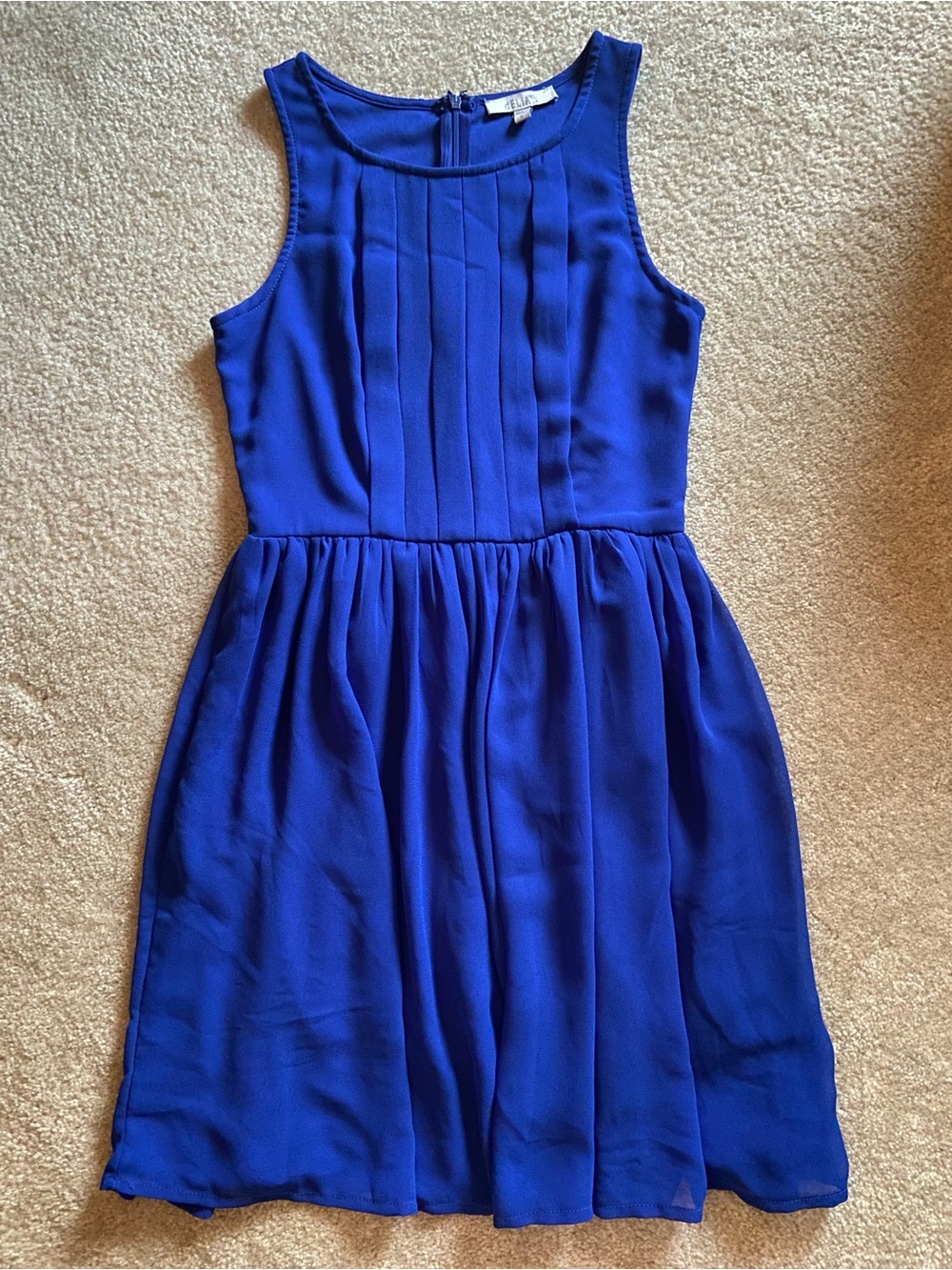 Delia’s pleated Front Royal Blue Dress